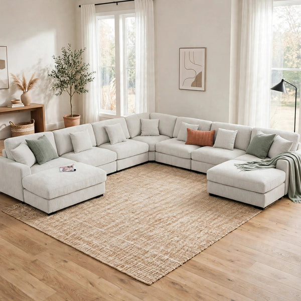 Avery 8-Seat Modular Sectional Sofa with 2 Ottomans - model home staged, no ottoman in front
