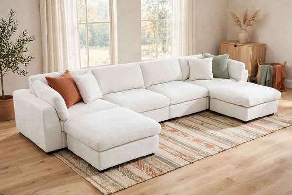Luis 4-Seat Modular Sectional with 2 Ottomans - model home staged, original smaller ottomans