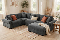 Oliver 4-Seat Modular Sectional with Nailhead Trim - model home staged